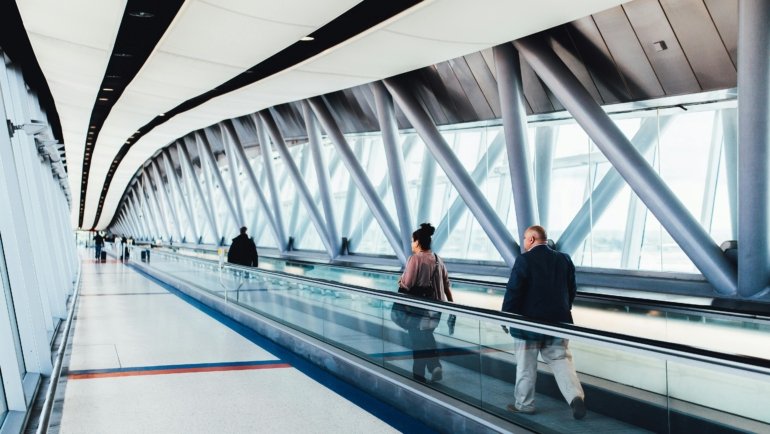 Traveler using Japan Trusted Traveler Program expedited immigration lane at airport