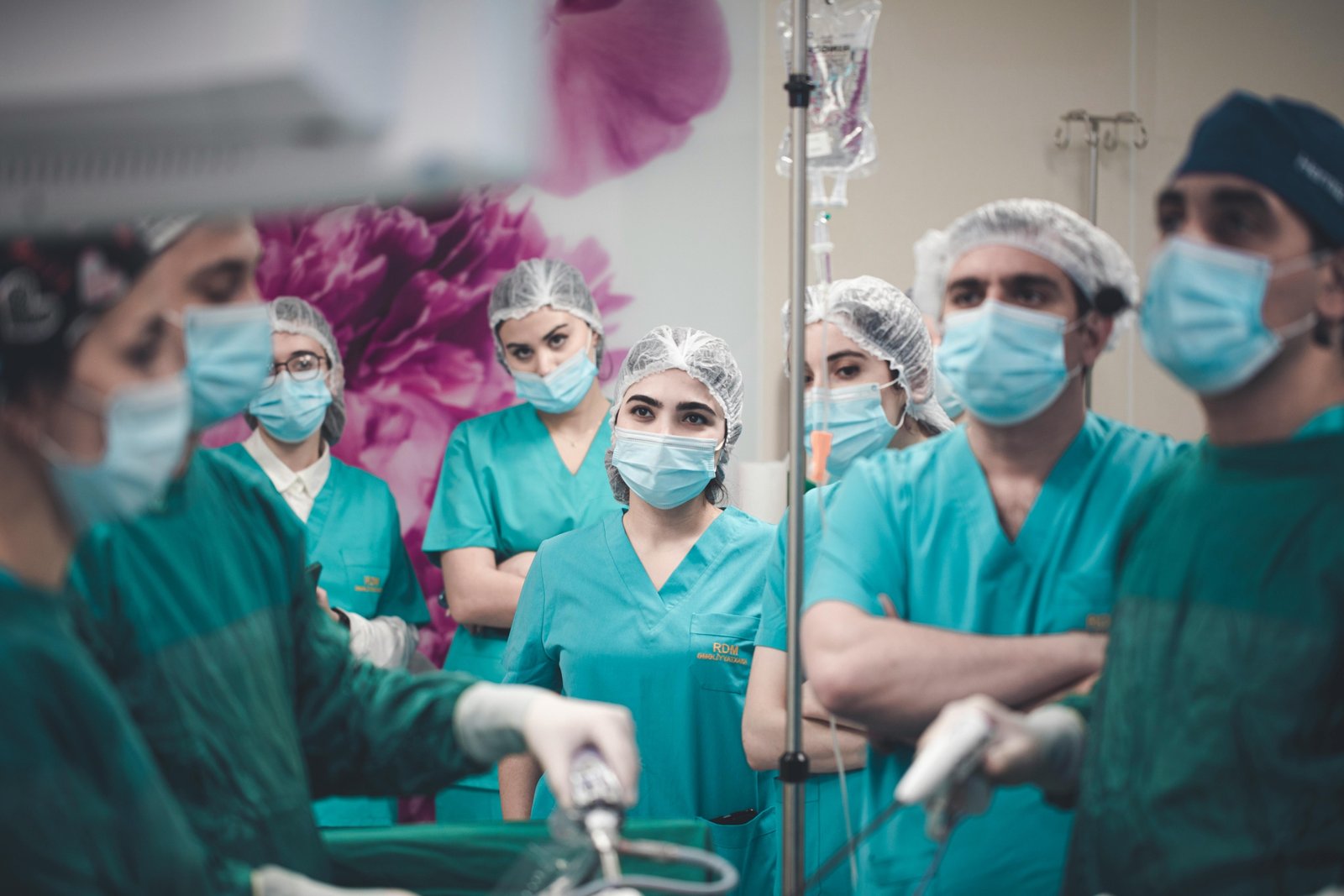 Traveling surgical technologist preparing an operating room in a hospital, showcasing medical expertise and career mobility