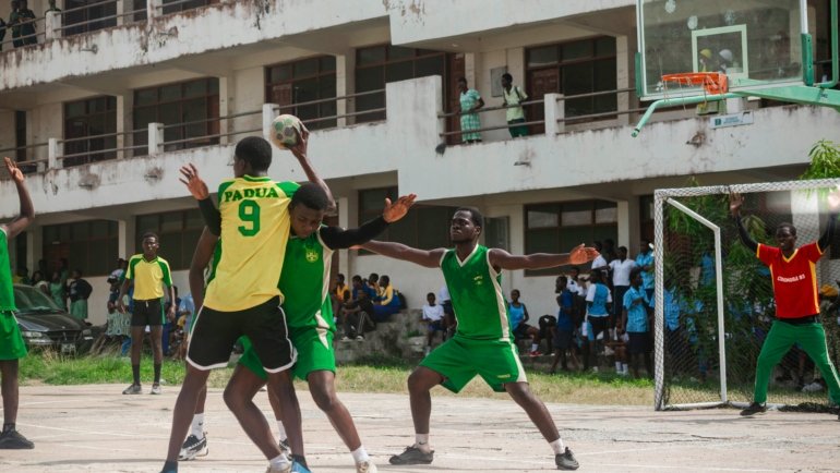 Young athletes competing in a travel sports tournament, highlighting teamwork and competitive youth sports environment
