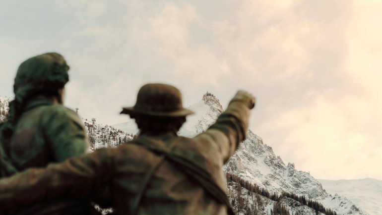 Travelers monument sculpture symbolizing adventure, courage, and cultural exploration