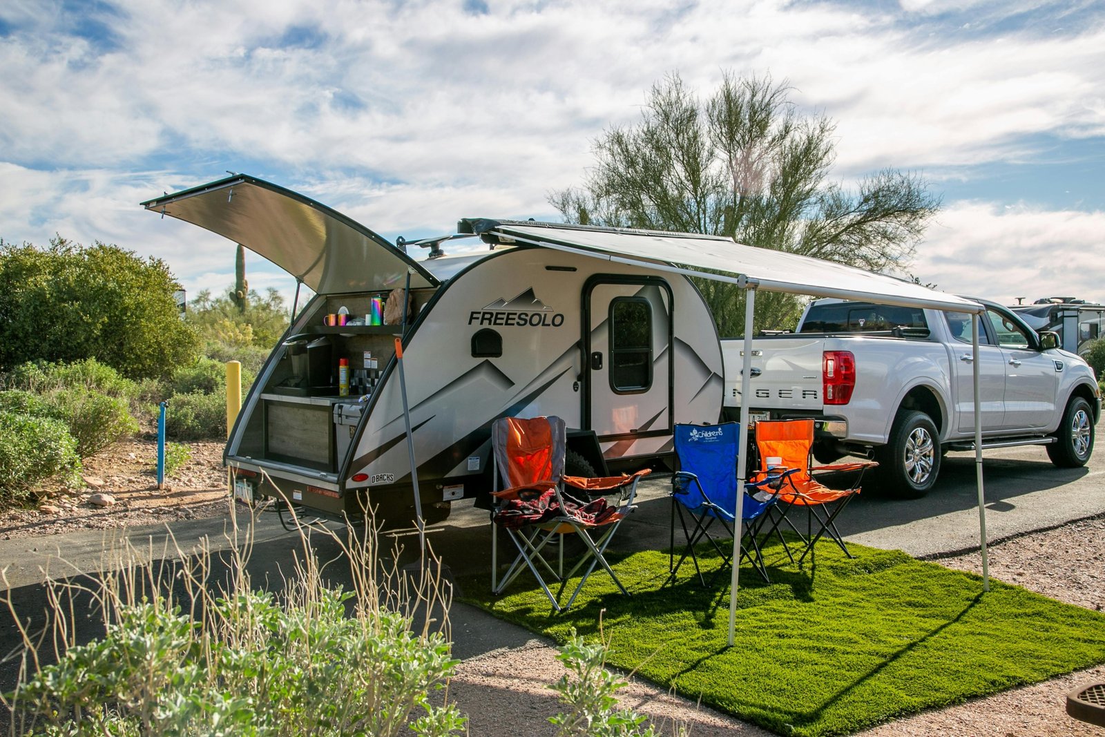Northwood travel trailer parked in a rugged outdoor setting showcasing durability and comfort for all-season camping