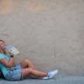 Traveler with backpack looking at a map outdoors, representing flexible and spontaneous luna travel style