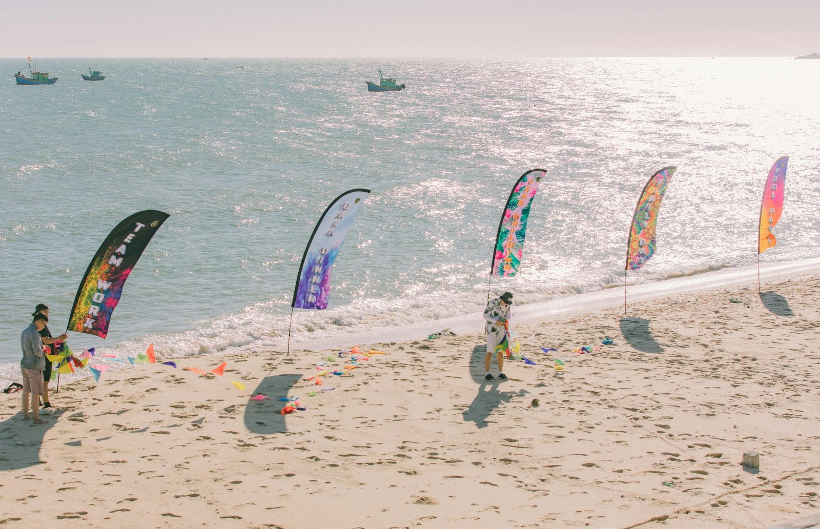 Sunny beach in Ghana during dry season with cultural festival and people enjoying outdoor activities