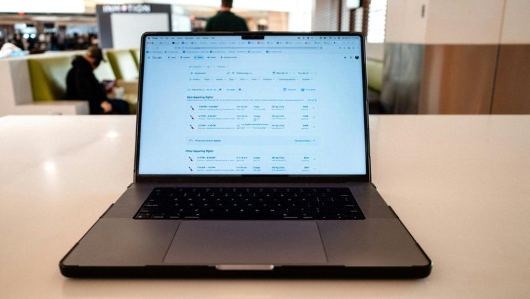 Traveler booking flights and accommodation directly online for better prices and flexible travel plans