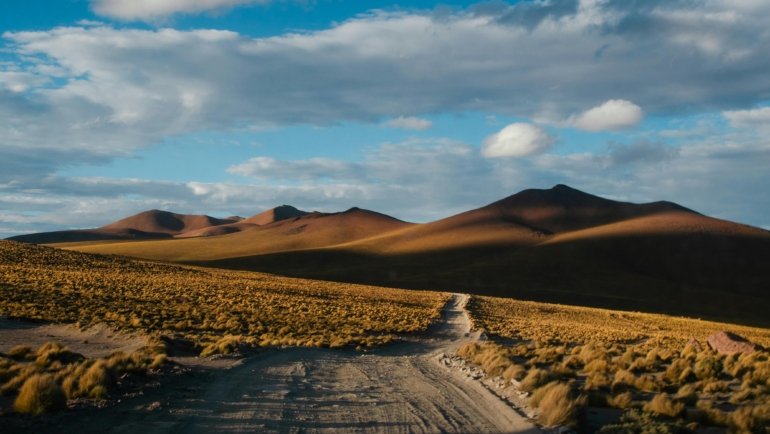 Scenic view of South America's mountains, rainforest, and beaches representing ideal travel destinations and seasons