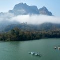 Scenic view of Laos landscape with ancient temples, lush nature, and cultural landmarks for travel package promotion