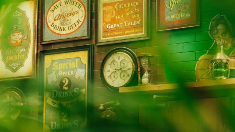 Retro vintage travel poster with bold colors and classic typography featuring a famous landmark and scenic views