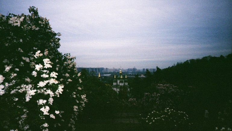 Beautiful European city with spring blossoms and sunny weather, perfect for May travel and cultural exploration