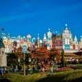 Happy family planning a Disney vacation with travel agent assistance