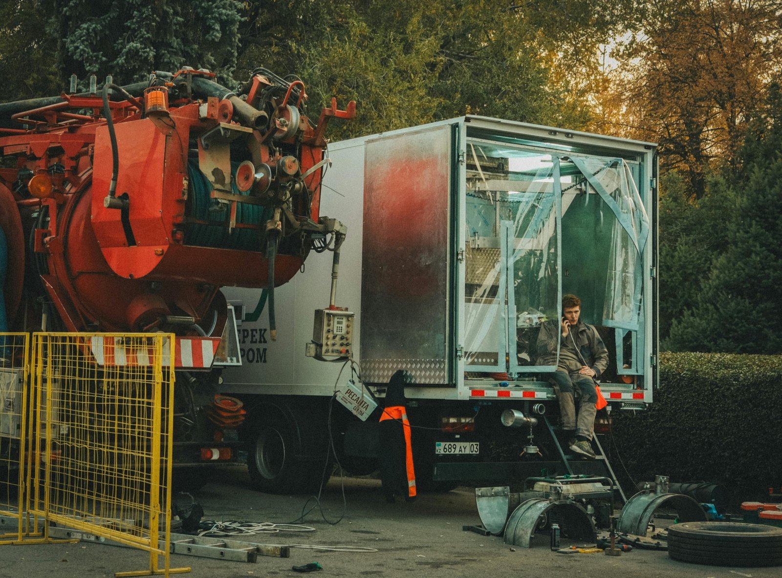 Close-up of a KZ travel trailer being serviced with genuine replacement parts and tools for safe and reliable maintenance