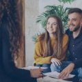 Travel agent assisting a traveler with personalized Charleston trip planning
