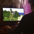 Player enjoying Octopath Traveler RPG game on PC with vivid fantasy visuals and immersive gameplay