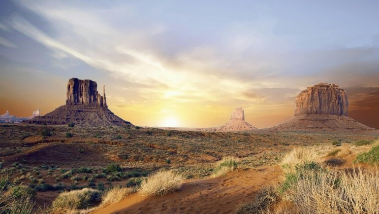 Stunning Arizona desert landscape with red rock formations at sunset showcasing natural beauty and travel adventure