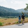 Nomadic traveler enjoying freedom on the road with health insurance coverage for medical emergencies