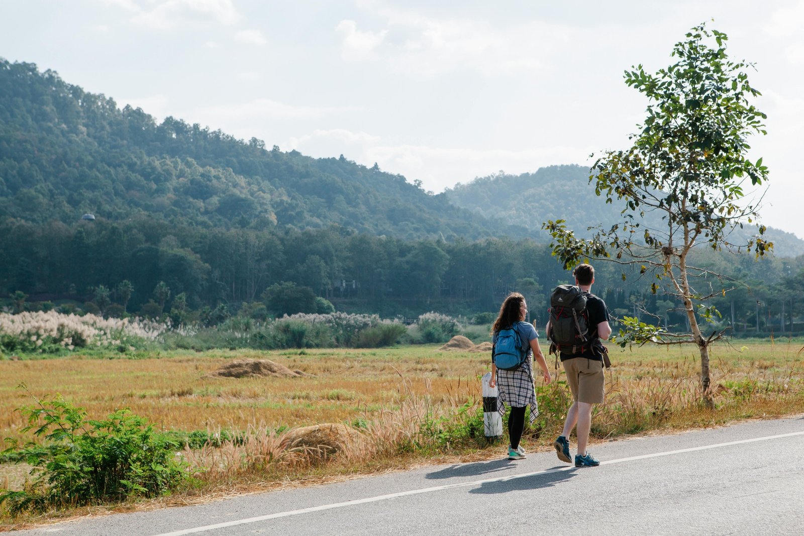 Nomadic traveler enjoying freedom on the road with health insurance coverage for medical emergencies