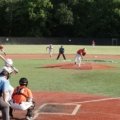 Youth baseball team competing in a travel tournament outdoors, representing Arkansas travel baseball competition and player development