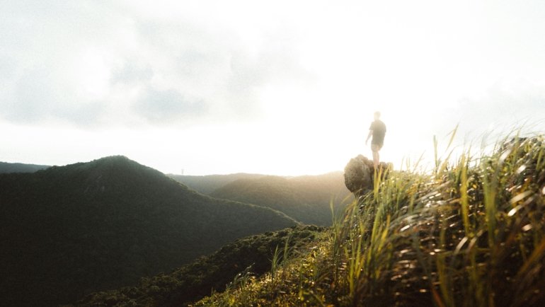Scenic travel landscape with a lone traveler exploring vibrant destinations inspiring adventure and wanderlust