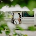 remote worker using laptop inside camper van illustrating flexible cross country travel job lifestyle