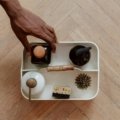 Compact travel bottle cleaning kit with brush and eco-friendly tablets for maintaining hygiene on the road