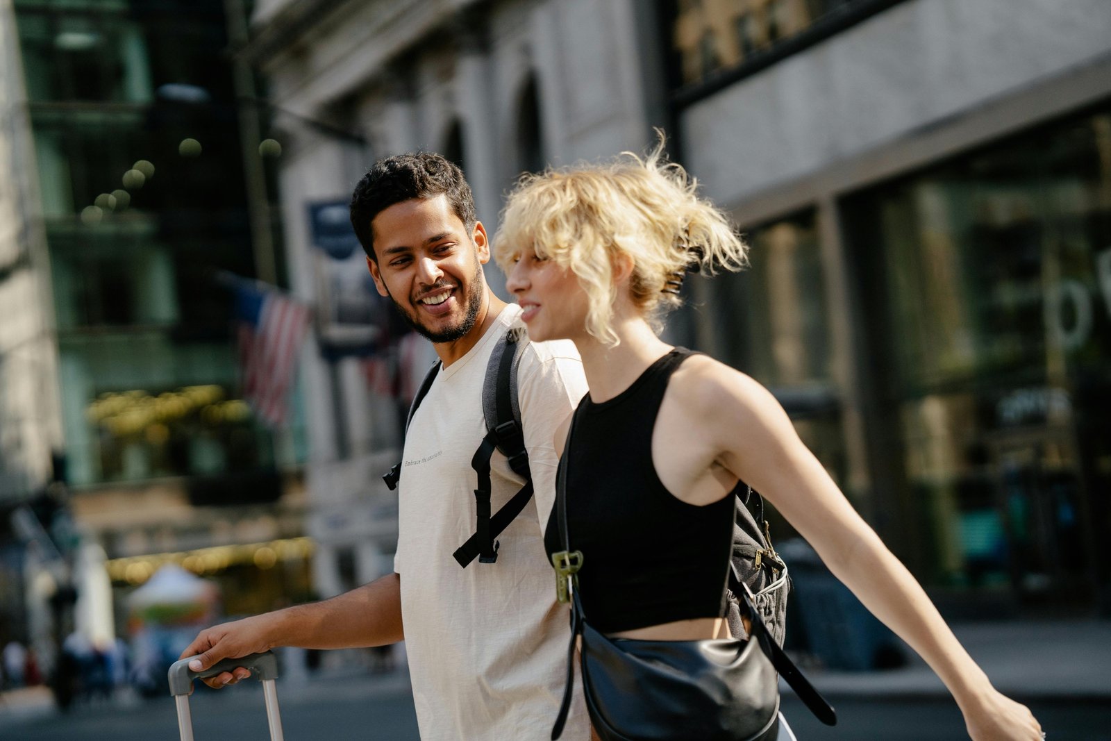 Friendly travel companion walking through a city street providing safety and local guidance for a traveler