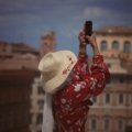 Solo traveler enjoying exploring a vibrant European city with historic buildings and friendly streets