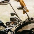 durable golf club travel case being handled at airport for protection during travel