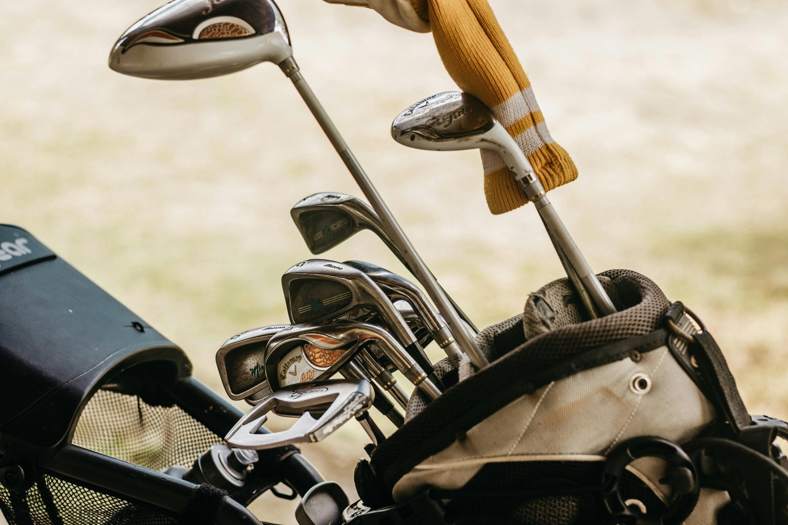 durable golf club travel case being handled at airport for protection during travel