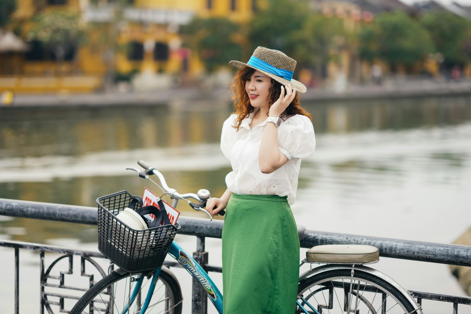 Woman wearing a lightweight travel skirt walking outdoors in city and nature settings, showcasing versatile and comfortable travel clothing
