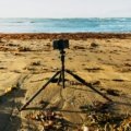 Lightweight travel tripod set up outdoors for stable photography during travel adventures