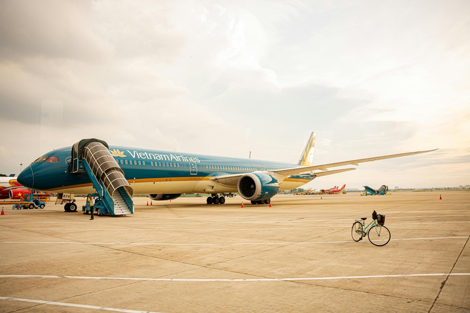 Bicycle packed in a durable hard-shell travel case ready for air travel at the airport