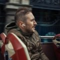 Traveler wearing a lightweight travel hoodie with hidden pockets, staying comfortable and stylish during journey