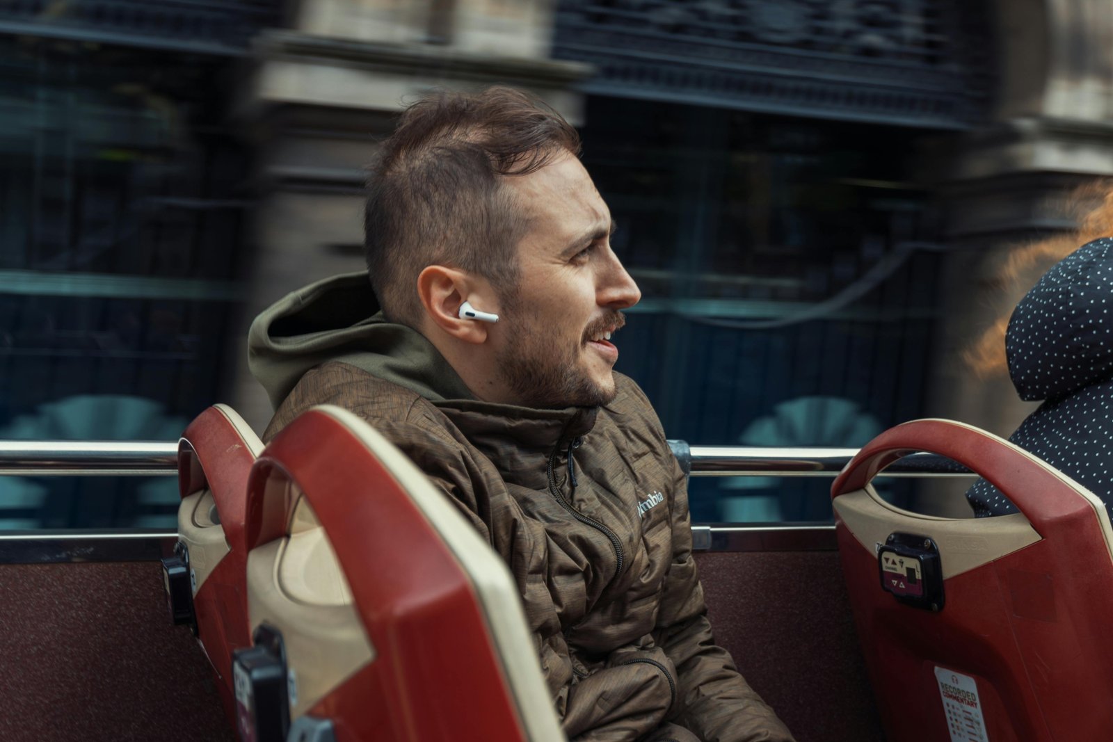 Traveler wearing a lightweight travel hoodie with hidden pockets, staying comfortable and stylish during journey