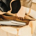 Elegant women's leather travel bag showcasing durability and style, perfect for versatile travel needs