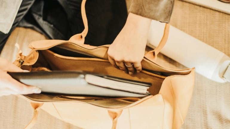 Elegant women's leather travel bag showcasing durability and style, perfect for versatile travel needs