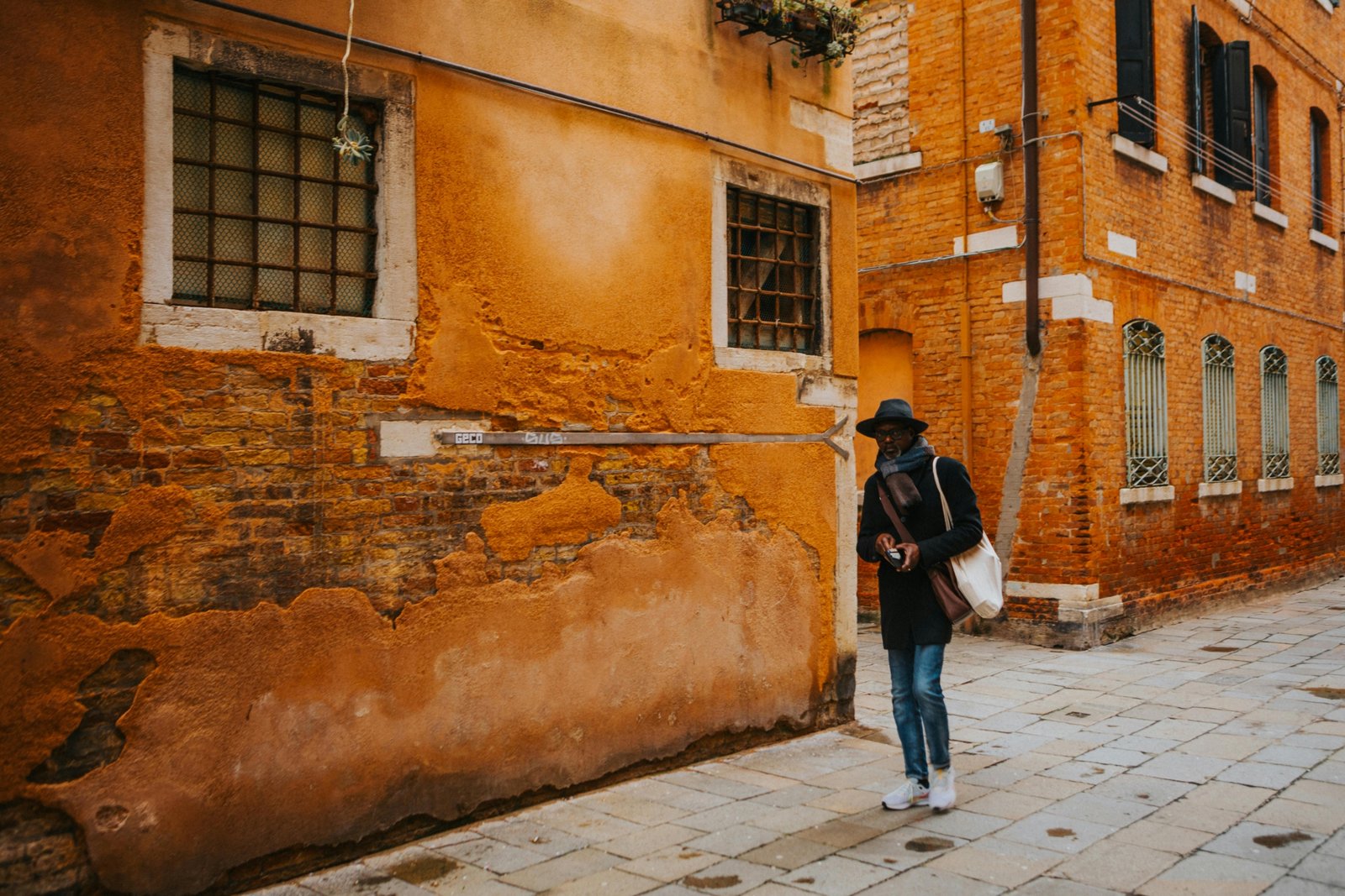 Solo traveler exploring charming European city streets with cultural landmarks and vibrant atmosphere