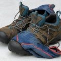 Comfortable stylish walking shoes for travel worn by a traveler on an outdoor path