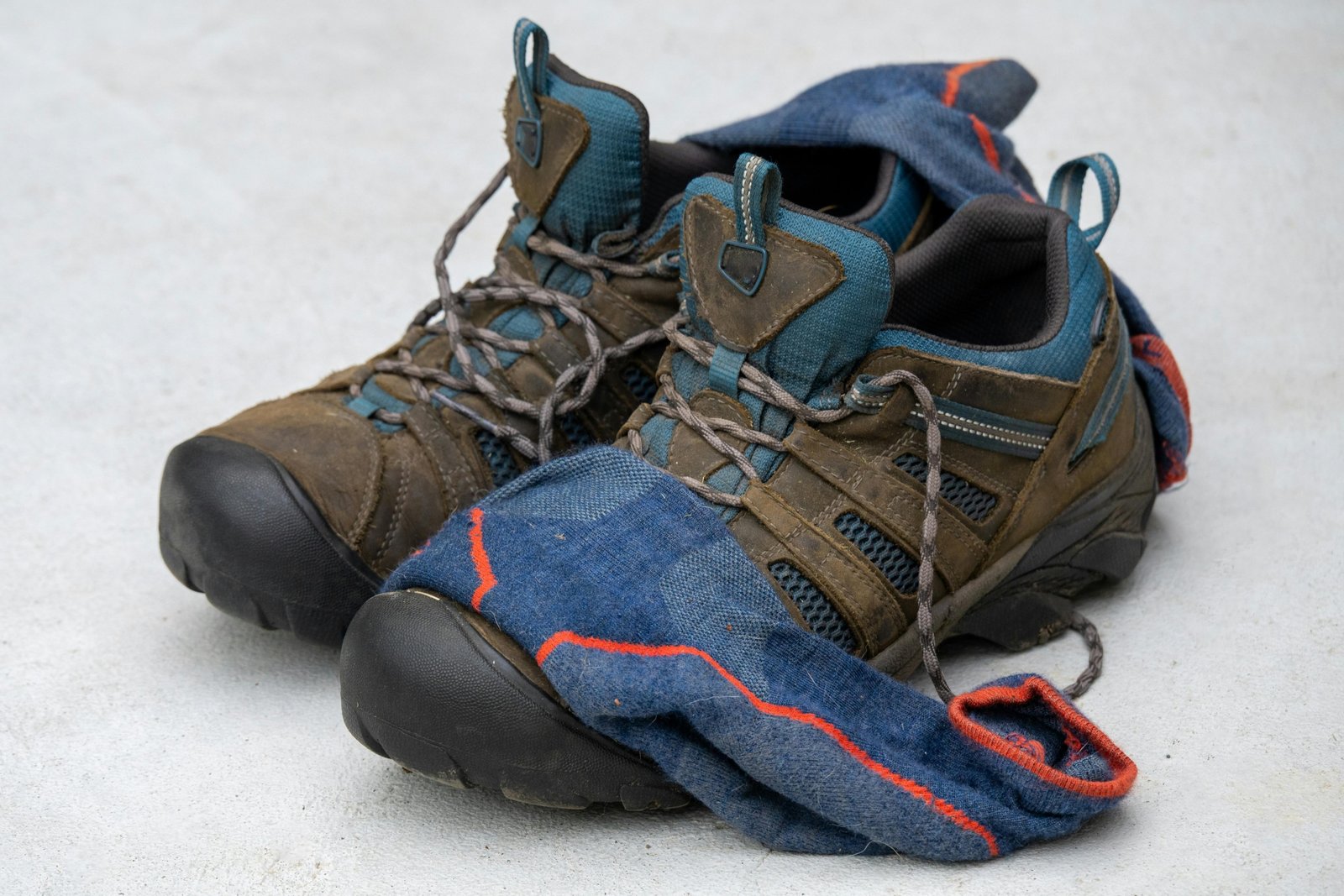 Comfortable stylish walking shoes for travel worn by a traveler on an outdoor path