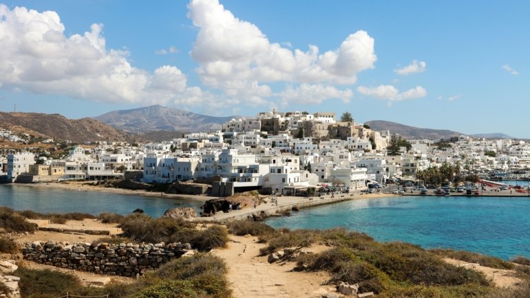 Compact Greece travel adapter with Type C and Type F plugs for safe charging of devices during international trips