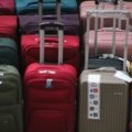 Disney travel bag packed for a trip with iconic character designs and organized compartments