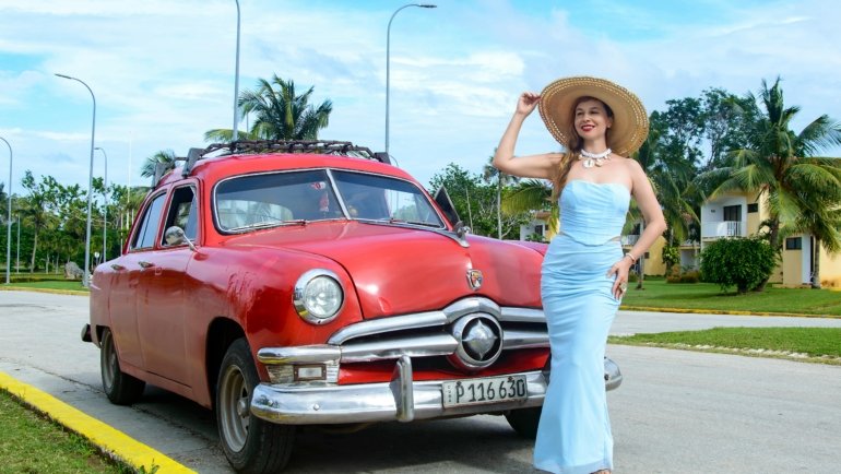 Woman wearing a versatile convertible travel dress outdoors, illustrating style and comfort for smart travel