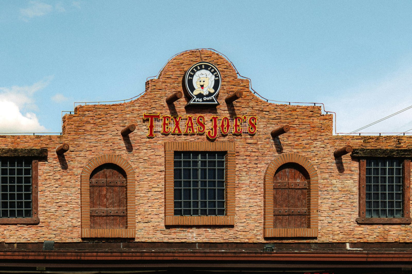 Texas BBQ smokehouse with smoked brisket, ribs, and friendly service in a cozy travel center setting