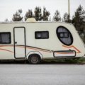 Modern well-built RV travel trailer parked outdoors symbolizing durability, comfort, and safe adventures