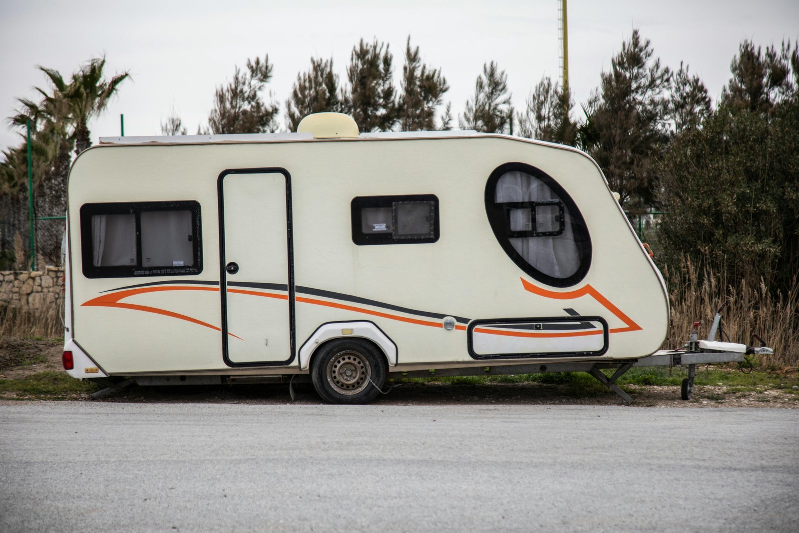Modern well-built RV travel trailer parked outdoors symbolizing durability, comfort, and safe adventures