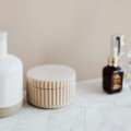 Organized travel toiletry bag with essential travel-sized shampoo, deodorant, toothbrush, and skincare products for a fresh and comfortable trip
