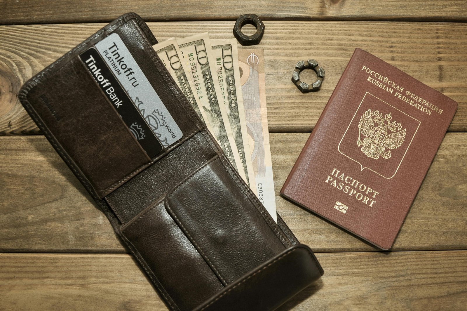Minimalist travel wallet with passport, credit cards, and boarding pass showcasing durability and RFID protection for secure travel
