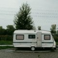 Two bedroom travel trailer parked in a scenic campsite providing privacy and comfort for family camping adventures