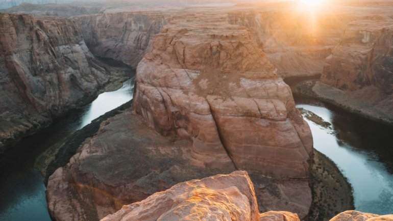 Sunrise over a stunning travel destination featuring mountains and cultural landmarks for unforgettable travel photography
