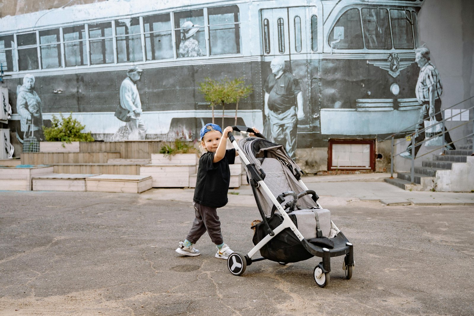 Lightweight compact travel stroller used by parents for easy transport during travel and outdoor adventures