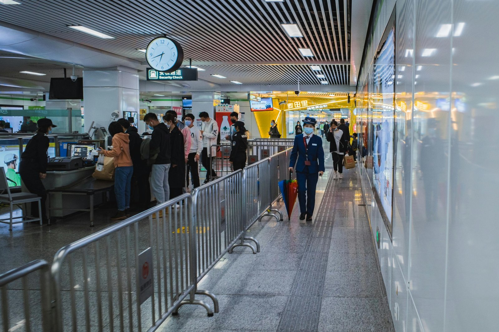 Travel security guard monitoring airport terminal ensuring passenger safety and security