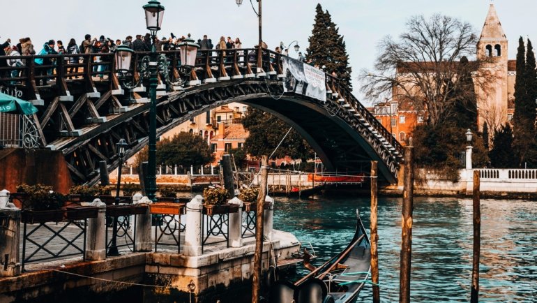 Scenic European travel destination in February with festive carnival celebration and mild winter weather